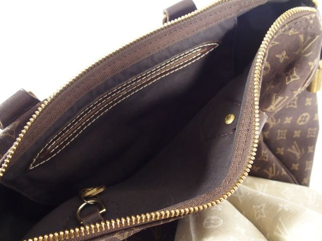Louis VUITTON. Deux sacs en toile, monogrammée.