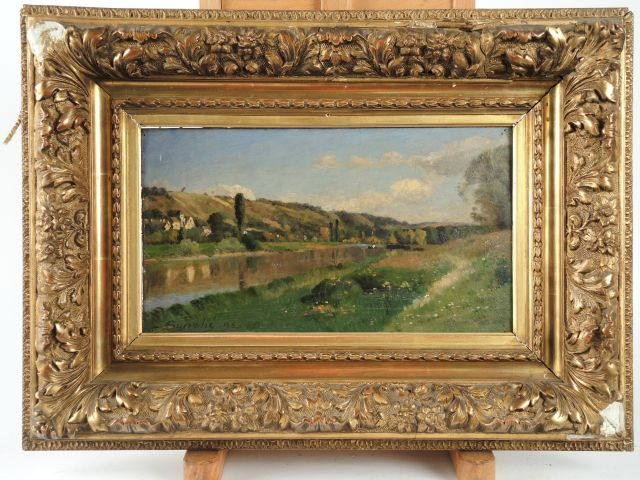 	BURICHE	 'Paysage à la rivière'. Huile sur panneau, 	signée en bas à 