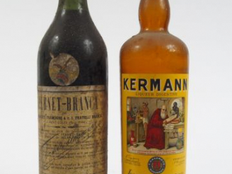 Vente aux enchères 2 TRES VIEILLES BOUTEILLES : 1 KERMANN CAZANOVE - 1 FERNET BRANCA