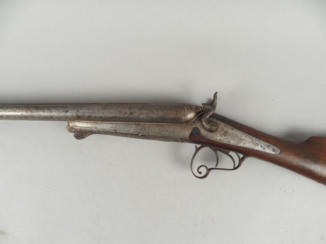 95- Fusil Juxtaposé à chiens extérieurs calibre 16/65. Canons damas me