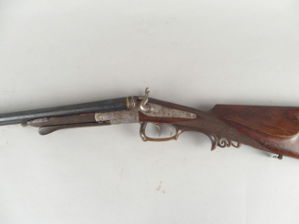 Vente aux enchères 175- Intéressant fusil de chasse à percussion centrale et à chiens cal