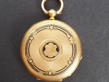 Montre de  à col en or jaune, cylindre 8 rubis, cadran émail, décor ém