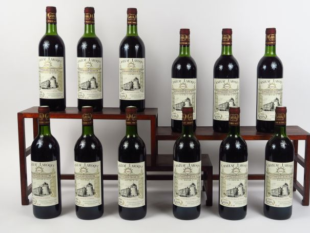 12 BOUTEILLES CHÂTEAU LAROQUE GC ST EMILION - 1983 - CBO - 8 LB /4 HEP