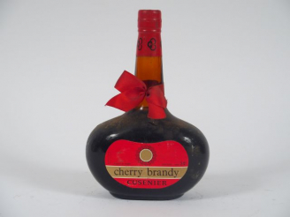 Vente aux enchères 1 BOUTEILLE CHERRY BRANDY CUSENIER 24°