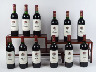 Vente aux enchères 12 BOUTEILLES CHÂTEAU MONTUS MADIRAN - 1991 - CBO - 7 BG/2 HEP/1 MEP