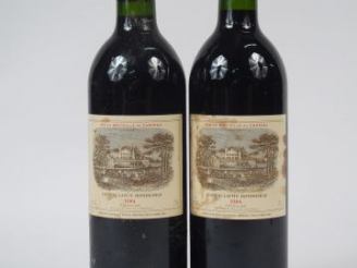 Vente aux enchères 2 BOUTEILLES CHATEAU LAFITE ROTHSCHILD 1ER GCC PAUILLAC - 1984 - 1 ET
