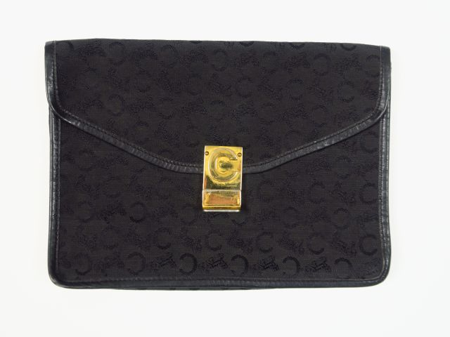 CELINE. Pochette en tissu noir.