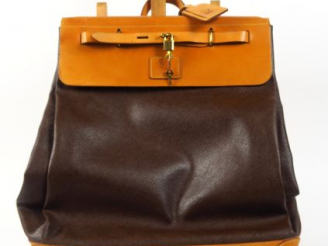 Vente aux enchères LA CORDONNERIE ANGLAISE. Sac de voyage en cuir.