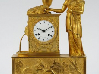 Vente aux enchères Pendule borne, début XIXème en bronze doré par Drouot à Paris, à décor