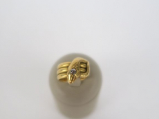 Vente aux enchères Bague serpent en or ornée d'un brillant, taille ancienne. 11 g tel