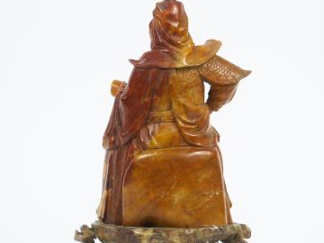 Groupe en stéatite représentant la divinité Gandi. Chine XXème.  H. 26