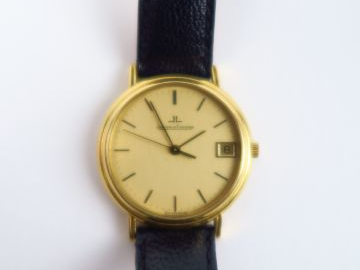JAEGER LECOULTRE. Montre, cadran en or, bracelet cuir. Poids tel : 32 