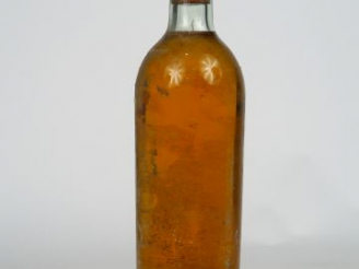 Vente aux enchères 1 BOUTEILLE CHÂTEAU COUTET 1er CC SAUTERNES - 1946 - BG/SE/BLS/BOUCHON