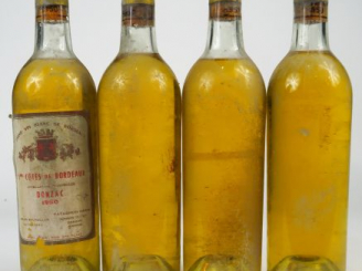 Vente aux enchères 4 BOUTEILLES CHÂTEAU DONZAC 1eres CÔTES DE BORDEAUX P. PATACHON - 1950
