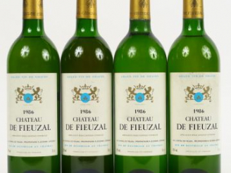 Vente aux enchères 4 BOUTEILLES CHÂTEAU DE FIEUZAL BLANC CC GRAVES - 1986 - 1 LB/3 HEP 