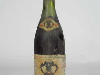 Vente aux enchères 1 BOUTEILLE CORTON CAVES DE LA REINE PEDAUQUE - 1957 - 4,5 CM/EA/BS