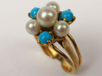 Vente aux enchères Bague en or jaune figurant une fleur, sertie de turquoises et petites 
