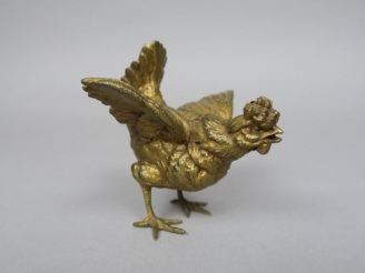 Vente aux enchères Sujet en métal doré 'Coq' Dim. 7,5 x 7 cm