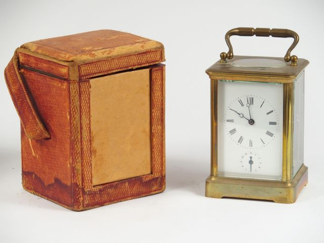 Pendulette d'officier XIXème dans son étui avec sa clé (étui usé)