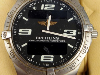Vente aux enchères BREITLING. Montre chronomètre d'homme en acier. Dans sa boite et écrin