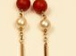 Collier en or jaune, perles de culture et corail. 51 cm  Poids tel : 1