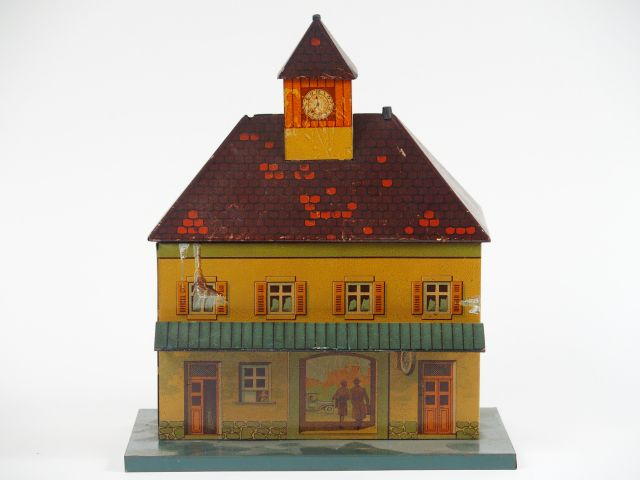 Petite gare en tôle lithographiée. 15 x 22 cm, état d'usage avec manqu