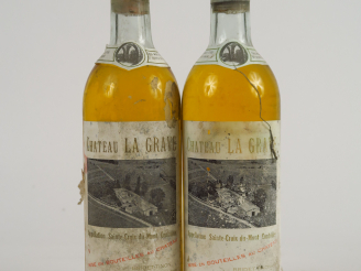 Vente aux enchères 2 BOUTEILLES CHÂTEAU LA GRAVE STE CROIX DU MONT - 1967 - HEP/BOUCHONS 