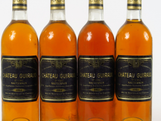 Vente aux enchères 4 BOUTEILLES CHÂTEAU GUIRAUD 1er CC SAUTERNES - 1984 - BG