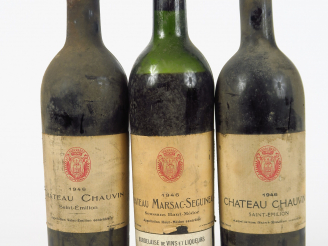 Vente aux enchères 3 BOUTEILLES 1946 : 2 CHÂTEAU CHAUVIN ST EMILION 1 HEP/1 MEP/BS - 1 CH