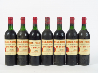 Vente aux enchères 7 BOUTEILLES CHÂTEAU FIGEAC 1er GCC ST EMILION - 1985 - 3 BG/1 LB/1 HE