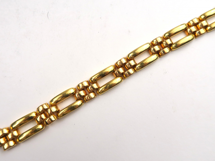  Bracelet tank en or deux tons. Poids  : 38,74 g ac