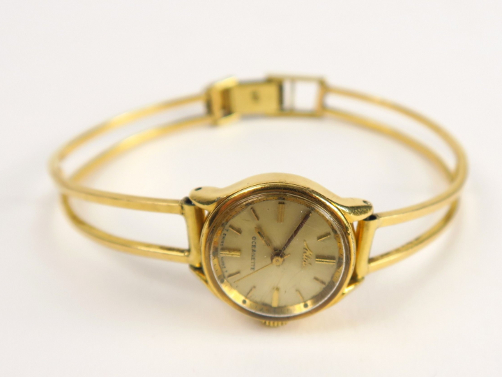 Montre bracelet en or. Poids  : 24,9 g
