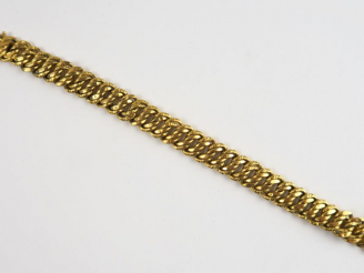 Vente aux enchères Bracelet en or, maille gourmette. Poids tel : 19,5 g