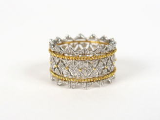 Vente aux enchères BUCCELLATI. Bague en or blanc, motifs en or jaune. Poids : 6 g