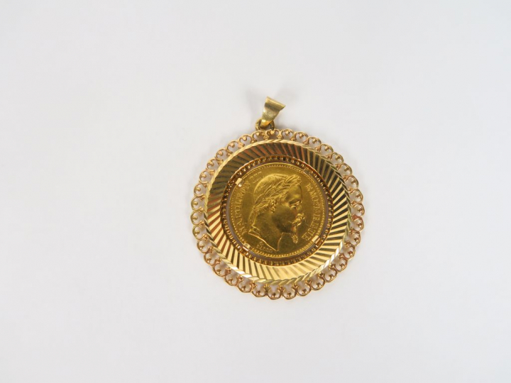 Pendentif en or orné d'une pièce de 20 Francs 1869. Poids. 12,41 gr