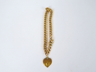 Vente aux enchères Bracelet en or, maille gourmette, retenant une médaille avec un ange. 