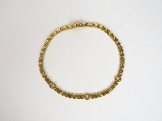 Vente aux enchères Collier articulé en or jaune. Poids. 36,86 gr