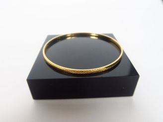 Vente aux enchères Bracelet en or jaune, à décor d'épis. Poids. 10 gr