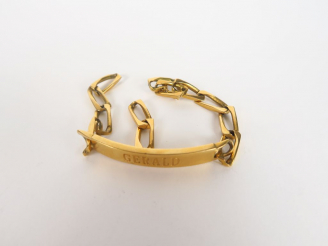 Vente aux enchères Gourmette en or.  Poids. 34 gr (gravée et accidentée)