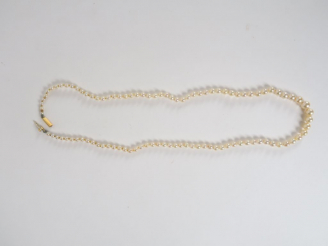Vente aux enchères Collier de perles en chute, fermoir en or.