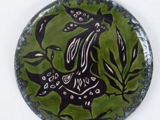 Vente aux enchères J. LURCAT. Grand plat en faience polychrome de Sant Vicens à décor de 