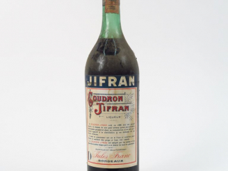 Vente aux enchères 1 VIEILLLE BOUTEILLE GOUDRON JIFFRAN
