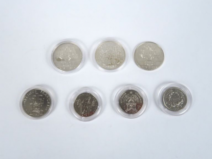 1 pièce de 100 francs (1989)  1 pièce de 100 francs (1987)  3 pièces d