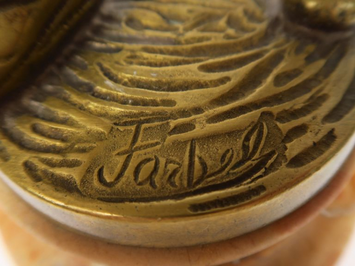 FARBEL. "Le jeune écolier". Sculpture en bronze, socle à doucine en ma