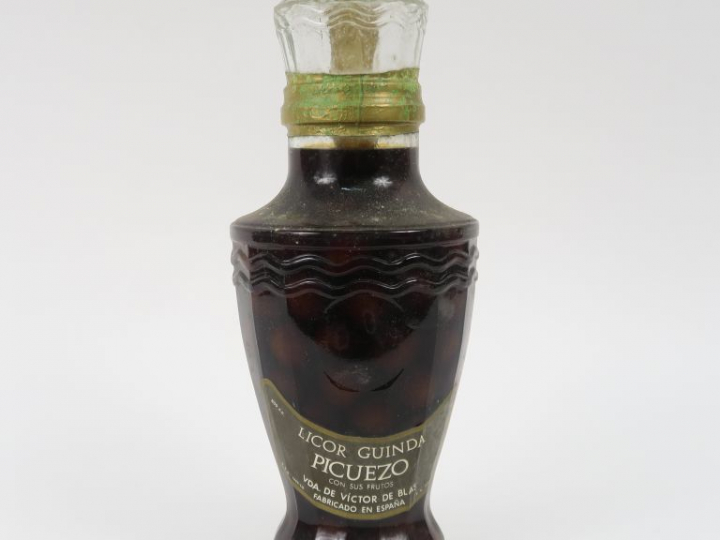 1 FLACON LICOR GUINDA PICUEZO