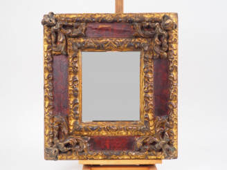 Vente aux enchères Miroir italien XVIIIème en bois polychrome et doré à décor de rinceaux