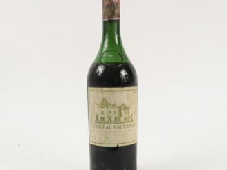 Vente aux enchères 1 BOUTEILLE CHÂTEAU HAUT BRION 1er GCC GRAVES - 1961 - 7 CM/EF/CAPS CO