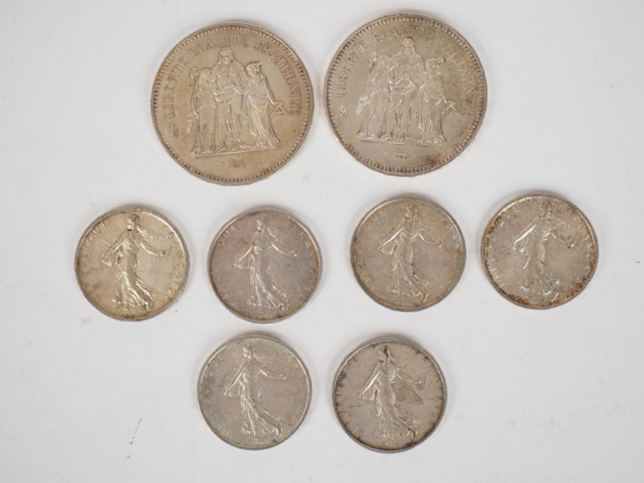 Ensemble de pièces en argent, comprenant :  - deux pièces de 50 Francs