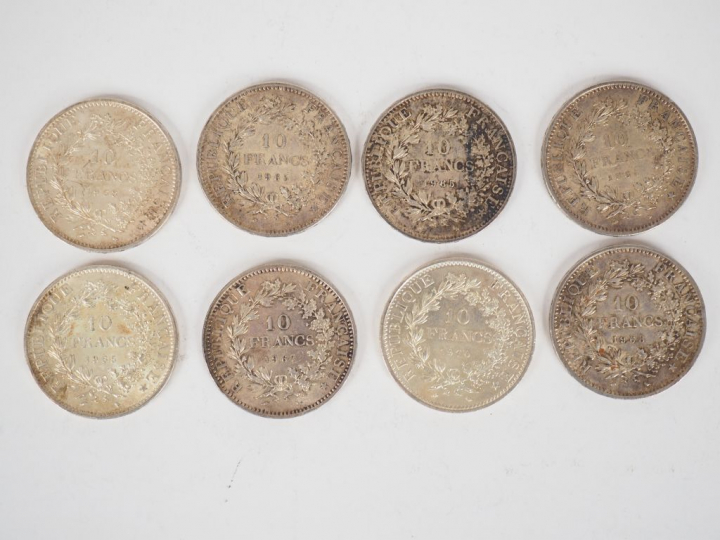 Ensemble de pièces en argent, comprenant :  - deux pièces de 50 Francs