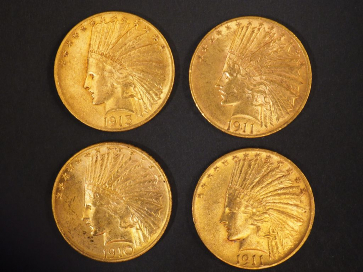 Quatre pièces de 10 Dollars or, 1910, 1911 (x2), 1913. FRAIS ACHETEURS